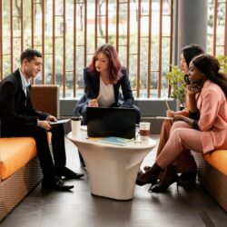 full-shot-woman-leading-meeting-indoors_23-2148868425