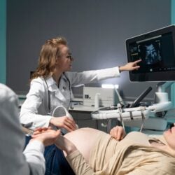 gynecologist-performing-ultrasound-consultation_23-2149353025