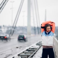 woman-stretching-before-running-on-the-bridge-at (1)